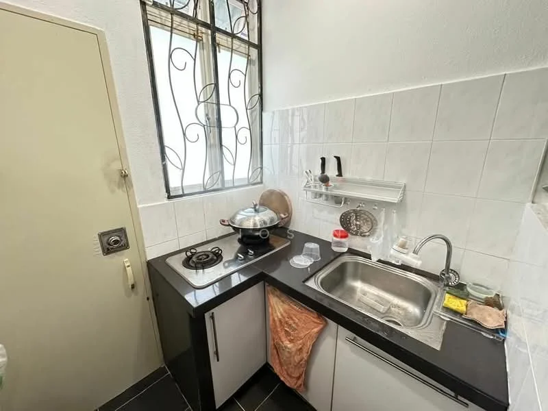Kitchen features: black granite countertop, single-bowl stainless-steel sink, chrome pull-down faucet, 2-burner gas hob, exhaust hood, white tiled backsplash, white cabinetry, black floor tiles, window with decorative grille, kitchen utensils on countertop; style: modern.