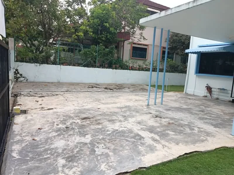 Exterior features: concrete flooring, fenced perimeter, manicured lawn, surrounding greenery, outdoor space, covered area with blue awning.