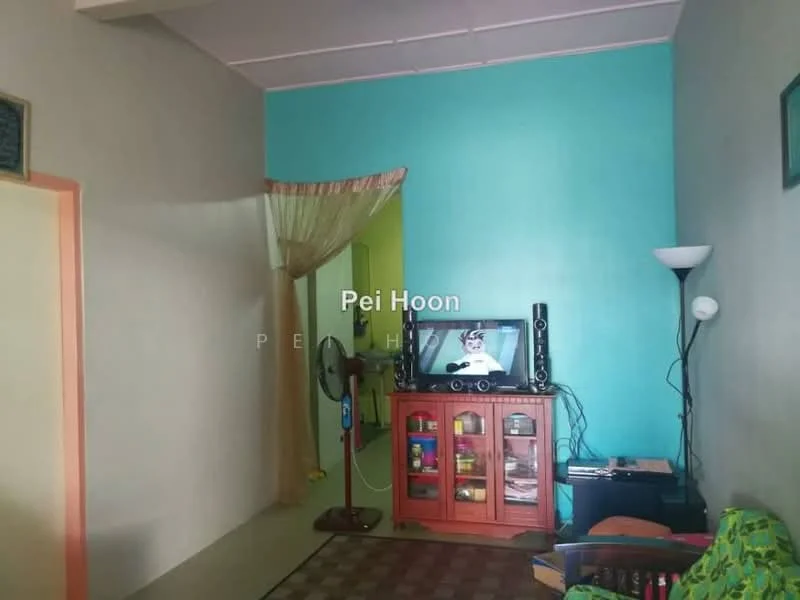 Living features: light green painted walls, cream painted walls, wooden cabinet with glass doors, television on cabinet, floor lamp, ceiling fan, area rug, decorative curtain, wooden flooring.
