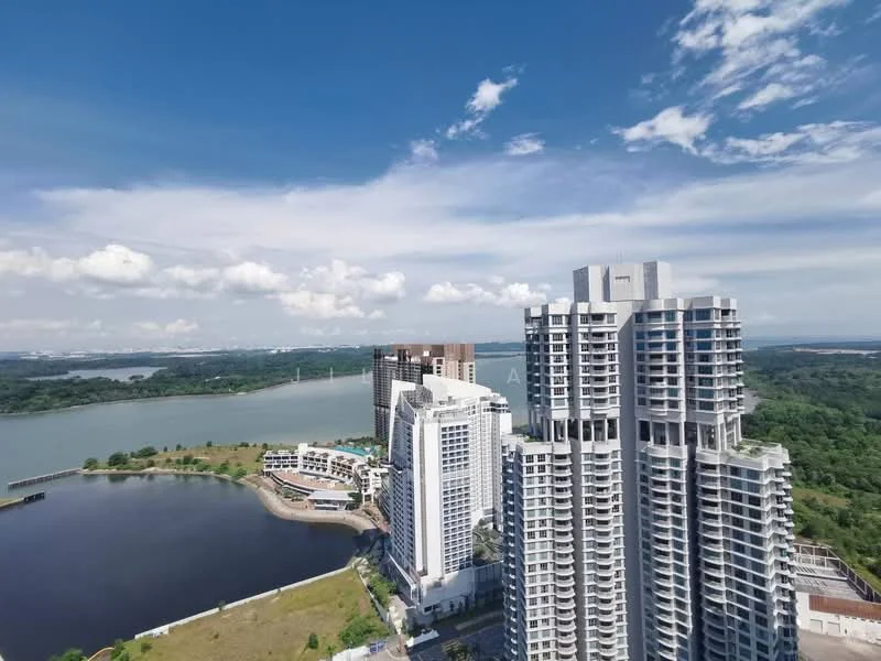 Exterior type: high-rise condominium; features: glass curtain wall, white painted facade, recessed balconies, surrounded by greenery, waterfront view, urban skyline in background; style: modern.