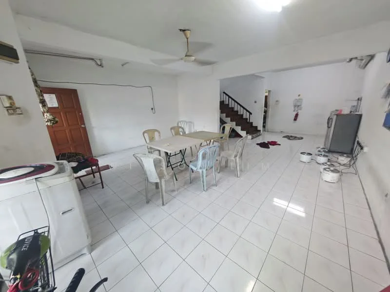 Dining features: white painted walls, white tiled flooring, ceiling fan, dining table with 6 chairs, wooden staircase in background, TV console, freestanding TV, laundry items on floor, open layout, natural light from windows.