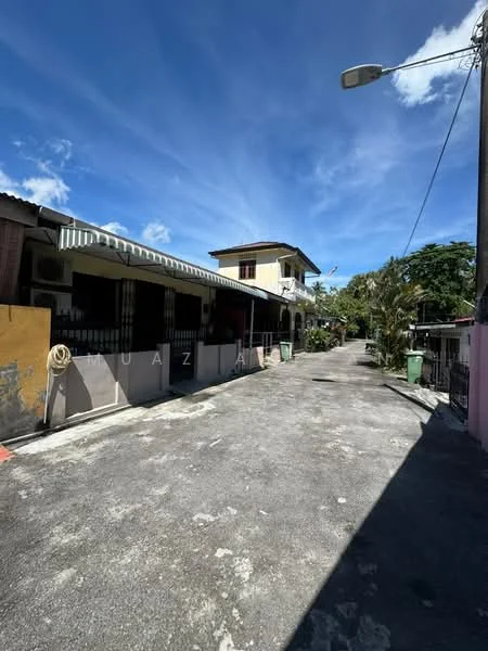 Exterior type: linked terrace house; features: single-storey, concrete pathway, manicured greenery, overhead street lighting, residential street view, painted facade, awnings over windows, visible utility bins; style: traditional.