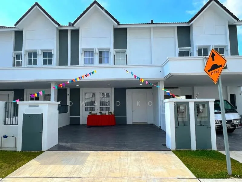 Exterior type: linked terrace house; features: white painted facade, grey accent walls, pitched tile roof, double-storey, manicured lawn, paved driveway, decorative bunting, front porch, security gate, parking space for 2 cars, street sign visible; style: modern.
