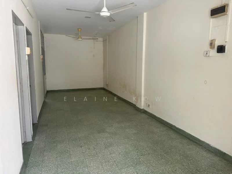 Room features: green speckled floor tiles, white painted walls, two ceiling fans, no visible windows, light switches on the wall, power outlet on the wall; style: minimalist.