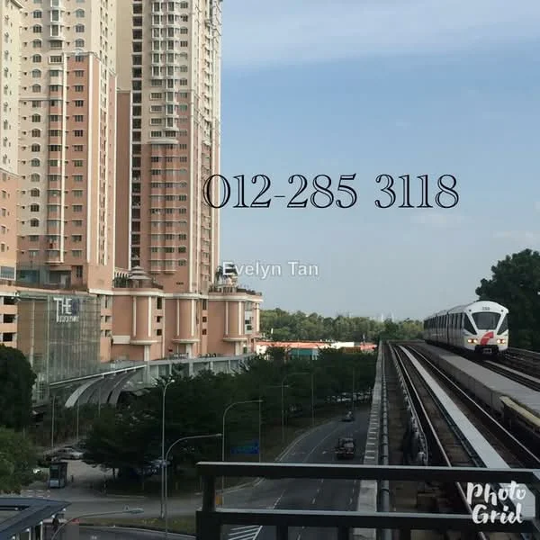 Exterior type: high-rise condominium; features: glass curtain wall, cream painted facade, recessed balconies, surrounded by greenery, adjacent to railway, multi-storey structure; style: modern.