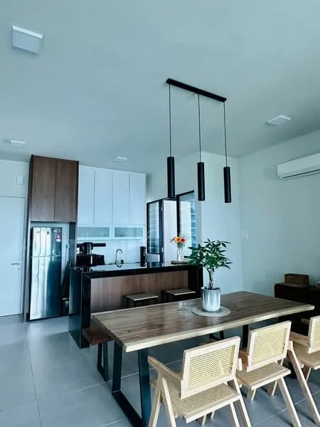 Kitchen features: white upper cabinets, brown lower cabinets, stainless-steel fridge, built-in oven, black countertop, kitchen island with seating, pendant lighting, recessed downlights, wall-mounted split AC; style: modern. Dining features: wood dining table, 4 cane dining chairs, decorative plant in pot, floor-to-ceiling windows, grey tiled flooring; style: modern.