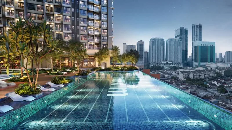 Exterior type: high-rise condominium; features: infinity pool, pool deck with loungers, landscaped garden with trees, city skyline view, modern architectural design, glass curtain wall facade, night lighting, surrounding urban environment; style: modern.