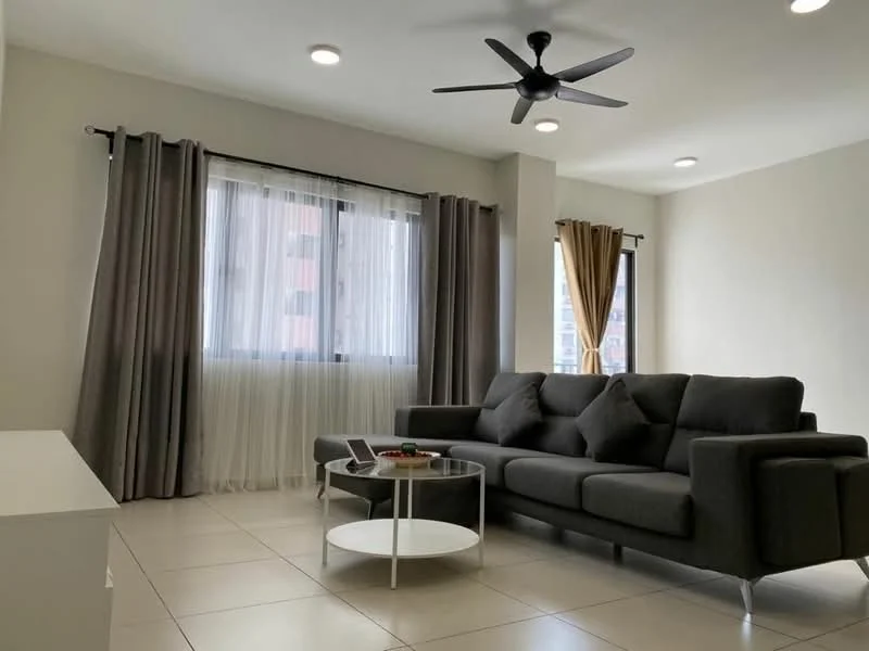 Living features: grey fabric sectional sofa, round glass coffee table, 2 decorative cushions, white TV console, floor-to-ceiling windows, sheer curtains, blackout curtains, recessed LED downlights, 5-blade ceiling fan with light, light-coloured tiled flooring, neutral painted walls; style: modern; view: city.