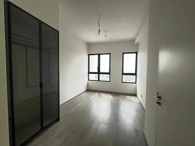 Room features: white painted walls, laminate flooring, floor-to-ceiling windows, black framed glass wardrobe, recessed ceiling lights, city view, neutral color scheme; style: modern; view: city.