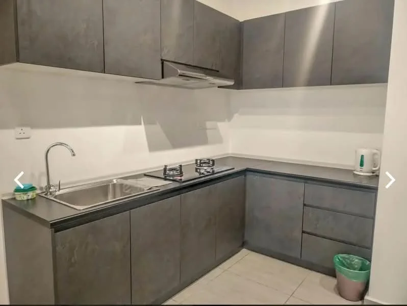Kitchen features: grey cabinetry, stainless-steel sink, chrome pull-down faucet, double-burner gas hob, built-in range hood, white countertop, ceramic tile flooring, kettle, green trash bin; style: modern.