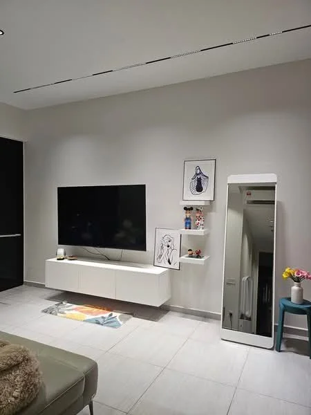 Living features: wall-mounted flat-screen TV, white media console, large full-length mirror, decorative wall art, light-colored tile flooring, recessed ceiling lights, neutral painted walls, small decorative vase with flowers; style: modern.