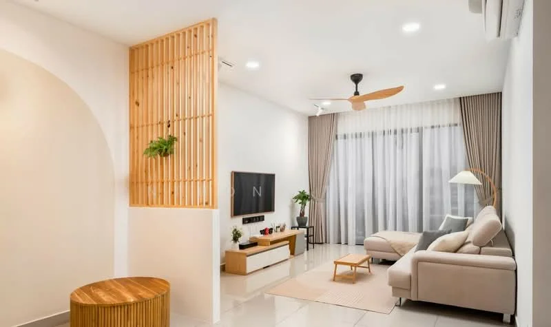 Living features: light grey fabric sofa, wooden coffee table, TV console with wall-mounted TV, floor-to-ceiling windows with sheer curtains, 5-blade ceiling fan with light, recessed downlights, decorative plant on console, wooden partition with plants, area rug, wall-mounted lamp; style: modern.