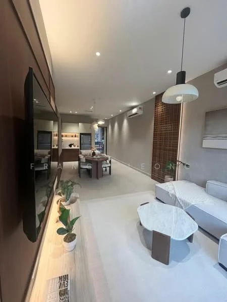 Living features: light grey walls, white ceiling with recessed downlights, 3-seater white fabric sofa, coffee table with marble top, TV console with wall-mounted TV, decorative plants in ceramic pots, dining table with chairs, air conditioning unit, wood panel accent wall, pendant light fixture; style: modern.