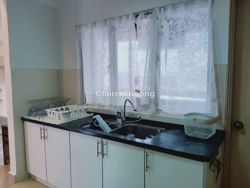 Kitchen features: single-bowl stainless-steel sink, chrome pull-down faucet, black countertop, white shaker cabinets, window with sheer curtains, dish drying rack, plastic storage container, kitchen utensils holder.