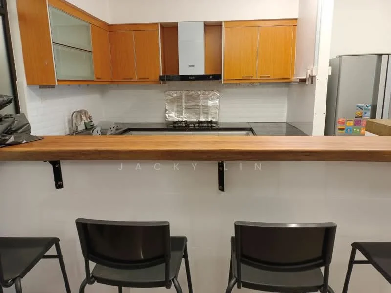 Kitchen features: wooden cabinetry in light brown, black countertop, stainless-steel range hood, built-in gas hob, white tiled backsplash, single-bowl stainless-steel sink, chrome pull-down faucet, bar counter with wooden top, black metal bar stools, refrigerator visible in background, glass-front upper cabinets, open shelving; style: modern.
