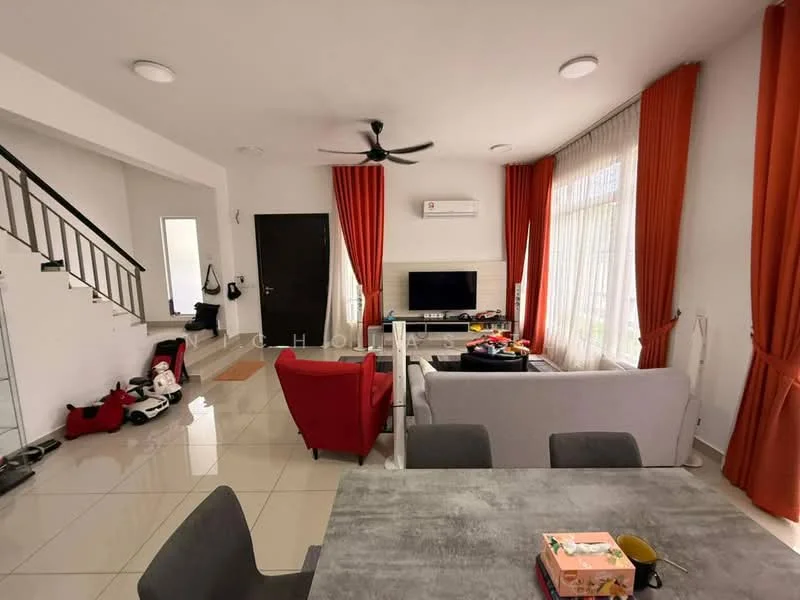 Living features: grey fabric sofa, red armchair, coffee table, wall-mounted TV, TV console, 5-blade ceiling fan with light, white painted walls, large windows with sheer curtains, tile flooring, air conditioning unit, decorative wall art, orange curtains; style: modern. Room features: staircase with metal railing, door leading to hallway.