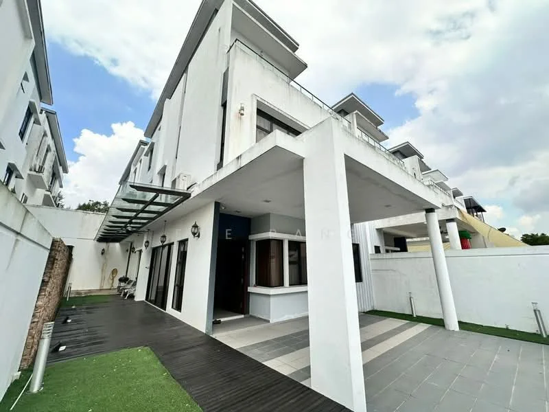 Exterior type: semi-detached house; features: white painted facade, flat roof, two-storey structure, glass canopy over entrance, outdoor wooden deck, paved walkway, manicured lawn, large windows, balcony on upper level, exposed concrete wall, surrounded by greenery; style: modern.