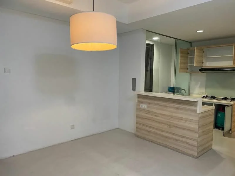 Kitchen features: white painted walls, concrete flooring, pendant light fixture, wood cabinetry, glass backsplash, built-in gas hob, stainless-steel sink, countertop with overhang for seating, open layout to living area; style: modern.