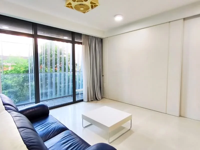 Living features: blue leather sofa, white coffee table, floor-to-ceiling windows, sheer curtains, white painted walls, recessed downlights, light fixture with decorative design, sliding glass door to balcony, neutral tile flooring; style: modern; view: garden.