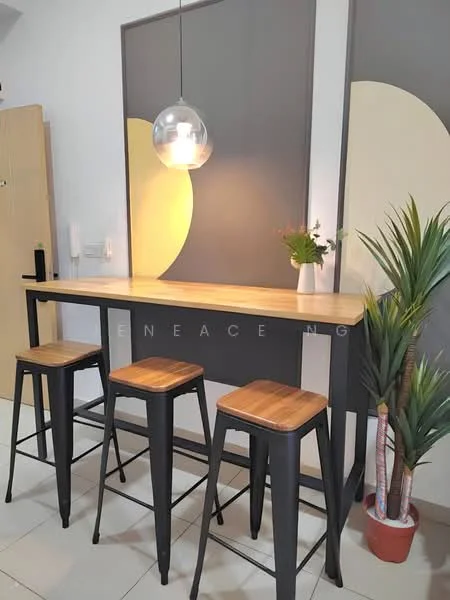 Room features: bar counter with wooden top, metal bar stools with wooden seats, pendant light fixture, grey accent wall, decorative plant in pot, wall art with circular patterns, white walls, tile flooring; style: modern.