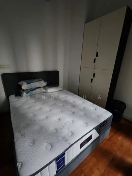 Bedroom features: queen-size bed, upholstered headboard, mattress with protective cover, two pillows, built-in wardrobe with sliding doors, wooden flooring, wall-mounted light switch, trash bin.
