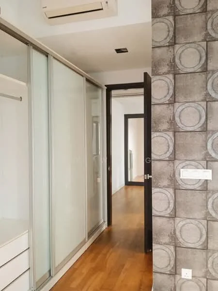Room features: wooden flooring, glass sliding wardrobe, decorative wall with circular pattern, white painted walls, recessed ceiling lights, wall-mounted split AC, doorway leading to another room; style: modern.