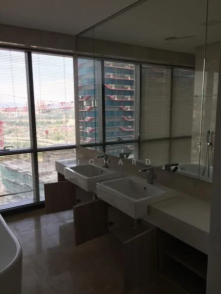Bathroom features: double-sink vanity with white ceramic sinks, chrome basin mixers, large wall-mounted mirror, light-colored stone countertop, wood cabinetry below sinks, floor-to-ceiling windows, city view, tile flooring, natural light; style: modern; view: city.