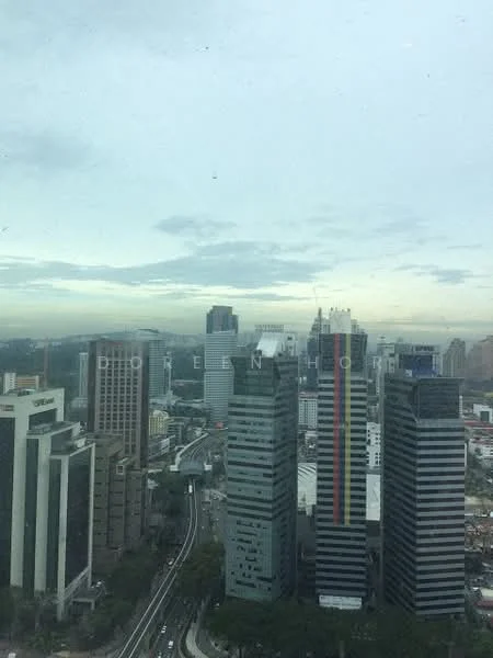 Exterior type: high-rise condominium; features: city skyline view, multiple high-rise buildings, urban landscape, roadway visible, cloudy sky, modern architecture; style: contemporary.