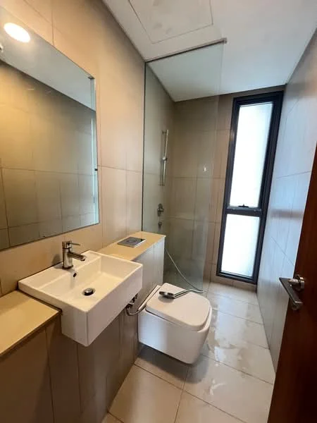 Bathroom features: wall-mounted sink, chrome basin mixer faucet, mirror above sink, glass shower enclosure, rain shower head, handheld shower, white toilet, tile flooring, beige tiled walls, window for natural light, sliding glass door; style: modern.