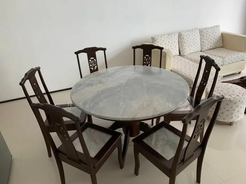 Dining features: round marble dining table, wooden dining chairs with intricate backrest design, cream upholstered sofa, light-colored fabric on sofa, polished tile flooring, neutral wall color, decorative area rug; style: modern.