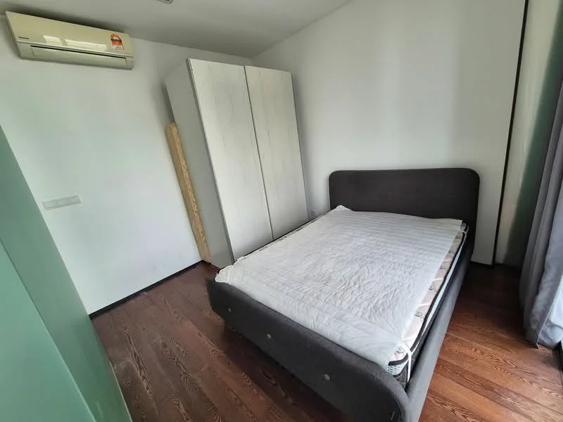 Bedroom features: queen-size bed, upholstered headboard, built-in wardrobe with sliding doors, wooden flooring, wall-mounted split AC, grey curtains, white painted walls; style: modern.