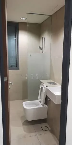 Bathroom features: white wall tiles, light beige floor tiles, glass shower enclosure, rain shower head, toilet, wall-mounted sink, chrome faucet, mirror above sink, window with grey frame, recessed ceiling lights; style: modern.