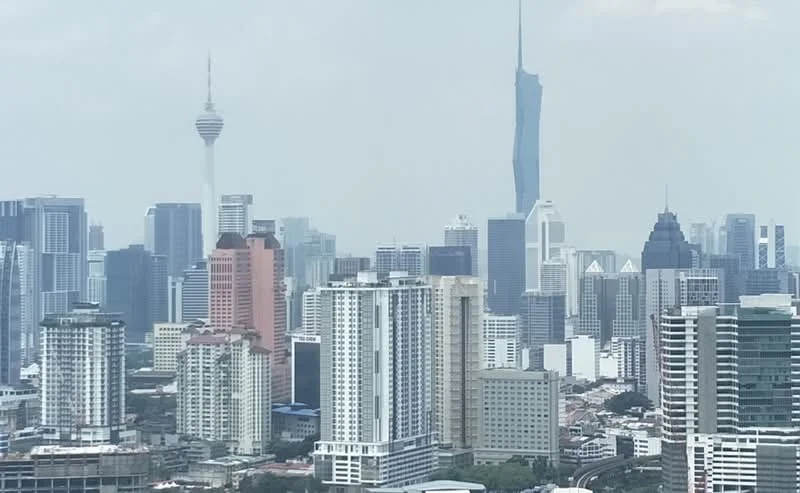 Exterior type: high-rise condominium; features: city skyline view, multiple high-rise buildings, modern architectural designs, glass curtain walls, varied building heights, urban landscape, surrounded by greenery; style: modern.