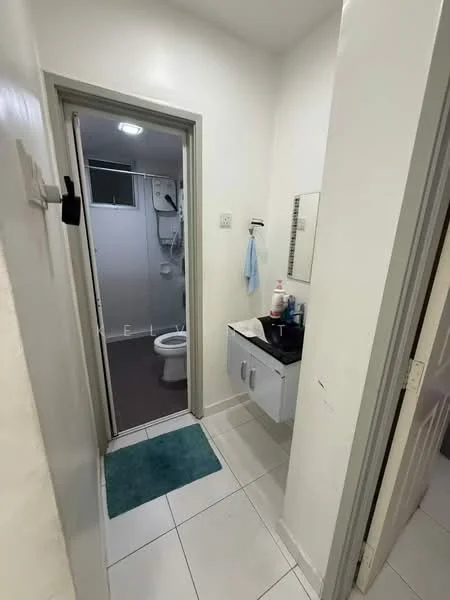 Bathroom features: white painted walls, grey tiled flooring, single-sink vanity with cabinet, framed mirror, toilet, shower area, ceiling light, towel rack, blue bath mat; style: modern.