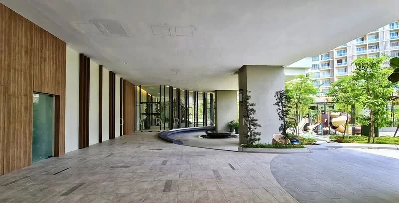 Exterior type: clubhouse; features: wood paneling on walls, large glass windows, water feature with curved edge, landscaped garden with trees, stone-paved walkway, open-air design, modern architectural elements, seating area with benches; style: modern.