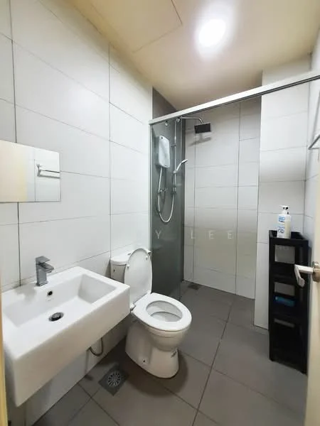 Bathroom features: white ceramic toilet, single-sink vanity with wall-mounted cabinet, chrome basin mixer faucet, glass shower enclosure, rain shower head, wall-mounted shower control, grey ceramic tile flooring, white tiled walls, recessed ceiling lights, black wall-mounted shelf; style: modern.