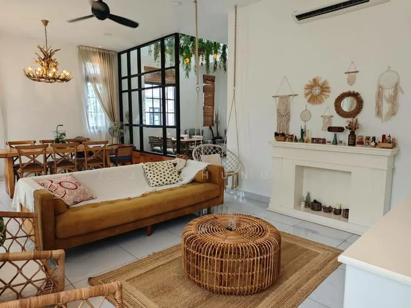 Living features: 3-seater fabric sofa in mustard yellow, coffee table with rattan design, area rug with natural fibers, wall-mounted air conditioning unit, decorative wall hanging, fireplace with mantel, wall decor with woven elements, ceiling fan with light, large windows with sheer curtains, decorative plants, wooden side table, open shelving with decorative items; style: bohemian. Dining features: 6-seater wooden dining table, wooden dining chairs, hanging light fixture, decorative wall with glass panels, plants hanging from ceiling; style: bohemian.