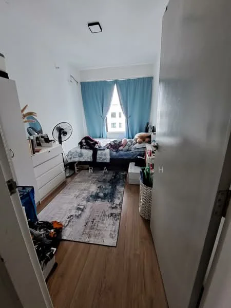 Bedroom features: queen-size bed with bedding, white dresser, floor-to-ceiling window with blue curtains, ceiling light fixture, wooden flooring, area rug with abstract pattern, wall-mounted fan, decorative plants, laundry basket; style: modern.