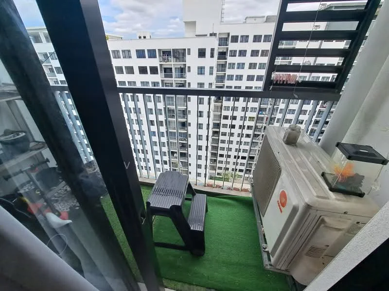 Room features: balcony with railing, artificial grass flooring, air conditioning unit, small step stool, high-rise building view, glass sliding door, white walls; view: city.