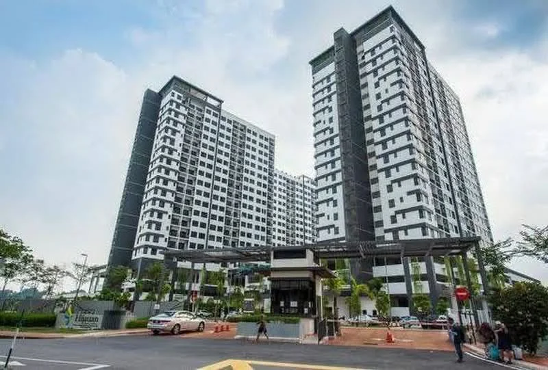 Exterior type: high-rise condominium; features: glass curtain wall, white painted facade, black accent panels, recessed balconies, landscaped entrance, manicured lawn, paved driveway, multiple storeys, security guard house at entrance, surrounded by greenery; style: modern.