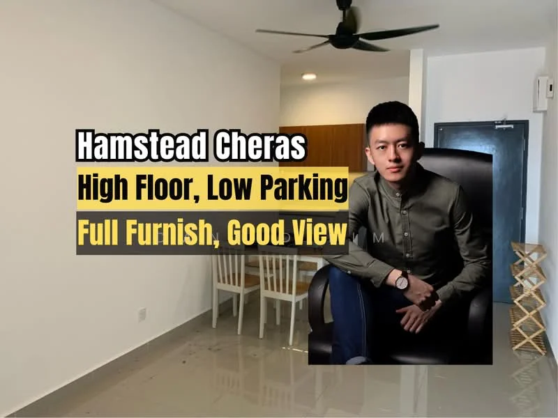 Room features: white painted walls, light-colored flooring, ceiling fan, wooden chair, black armchair, small folding chair, kitchen cabinetry visible in background, doorway leading to another room; style: modern.