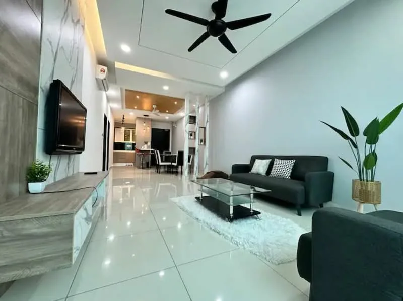 Living features: grey fabric sofa, black coffee table, white area rug, wall-mounted TV, light wood TV console, recessed ceiling lights, 5-blade ceiling fan, decorative houseplants, white walls, glossy tile flooring; style: modern. Kitchen features: open kitchen layout, stainless-steel appliances, kitchen island, dining table with chairs, white cabinetry, black countertop, pendant lighting; style: modern.