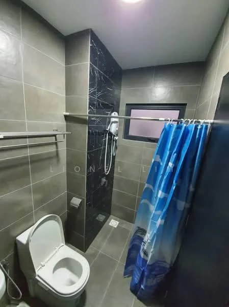 Bathroom features: grey ceramic tile flooring, dark grey tile accent wall, white toilet, shower area with handheld shower, glass shower screen, blue shower curtain, wall-mounted shower head, small window, towel rack; style: modern.