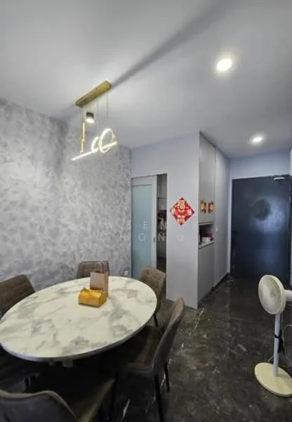 Dining features: round marble dining table, upholstered dining chairs, pendant light fixture, grey accent wall, dark polished floor, built-in cabinetry, glass door, wall-mounted fan; style: modern.