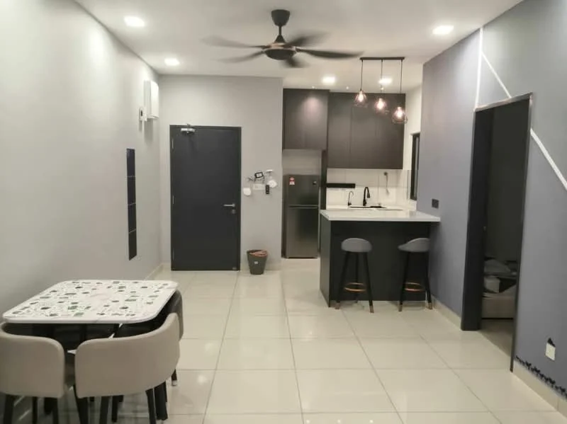 Living features: white painted walls, grey accent wall, polished ceramic tile flooring, 5-blade ceiling fan with light, recessed LED downlights, kitchen island with seating, stainless-steel fridge, black cabinetry, white countertop, sink with gooseneck faucet, black bar stools, dining table with four chairs; style: modern.