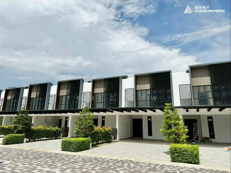 Exterior type: linked terrace house; features: white painted facade, black window frames, recessed balconies, flat roof, manicured landscaping, paved driveway, green shrubs, outdoor lighting, multiple storeys, modern architectural design; style: modern.