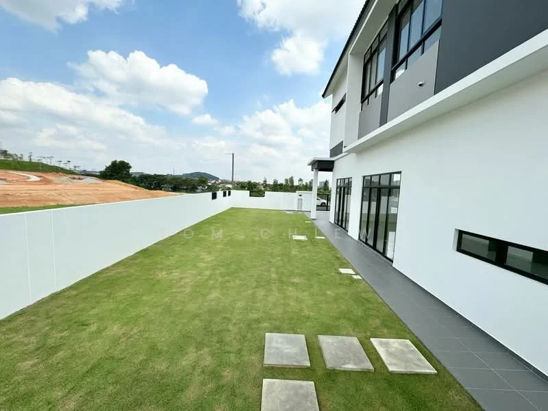 Exterior type: detached bungalow; features: manicured lawn, stone-paved walkway, white painted facade, flat roof, large windows, outdoor space, surrounded by greenery, mountain view in background; style: modern.