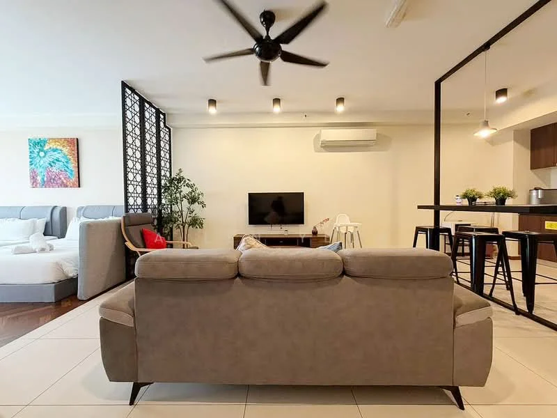 Living features: 3-seater fabric sofa in grey, wall-mounted TV, coffee table, ceiling fan, recessed LED downlights, decorative artwork on wall, floor-to-ceiling windows, plant in ceramic pot, open layout, tile flooring; style: modern. Bedroom features: queen-size bed, upholstered headboard, bedside lamps, built-in wardrobe; style: modern.