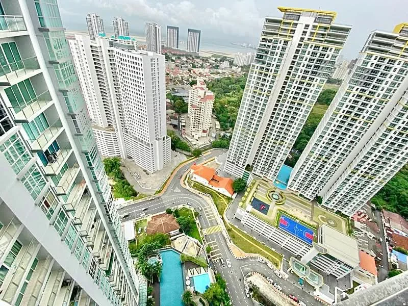 Exterior type: high-rise condominium; features: glass curtain wall, recessed balconies, multiple high-rise buildings, swimming pool, children's playground, tennis court, landscaped gardens, city skyline view, surrounded by greenery, urban context, road access, parking areas; style: modern.