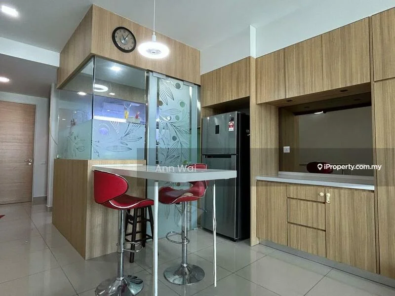 Kitchen features: brown wooden cabinetry, white countertop, stainless-steel fridge, bar-height table with two red stools, glass partition with floral design, built-in oven, ceramic tile flooring, recessed downlights, wall-mounted clock; style: modern.